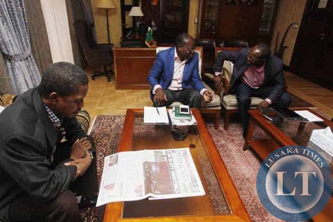 His Excellency Mr. Edgar Chagwa Lungu President of the Republic of Zambia (left) getting briefings from his aides Amos Chanda Special Assistant-Press (centre) and Kaizer Zulu Special Assistant Political (right) at Sheraton Hotel on Monday, June 22,2015. PICTURE BY SALIM HENRY/STATE HOUSE © 2015
