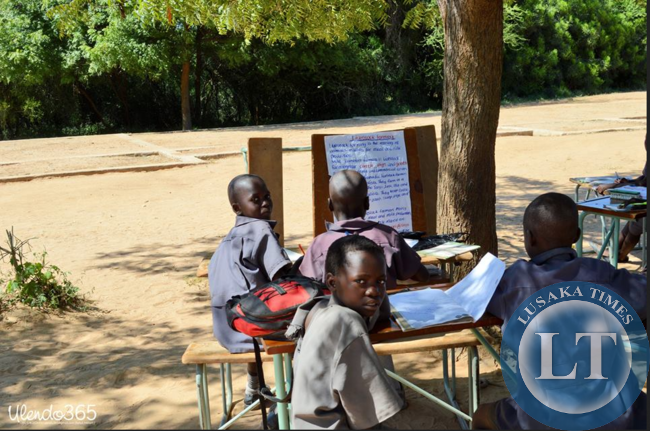 Children learning under a tree at Sialwala Primary School located in Sinazongwe,due to lack of classrooms.
