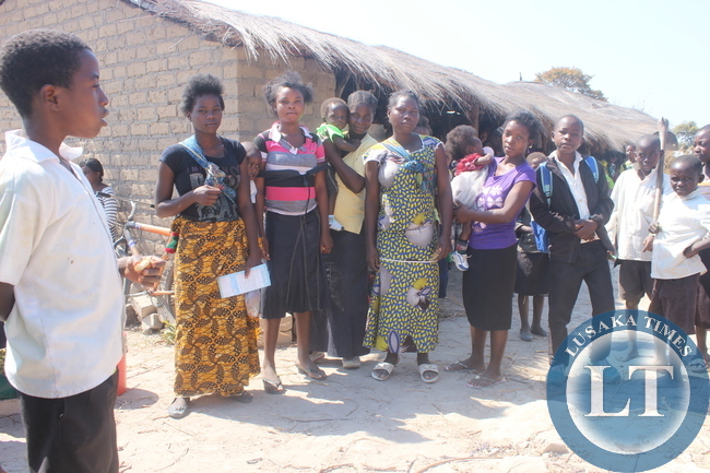 Some teenage mothers pose for a photo at Kaishe Community Health Center