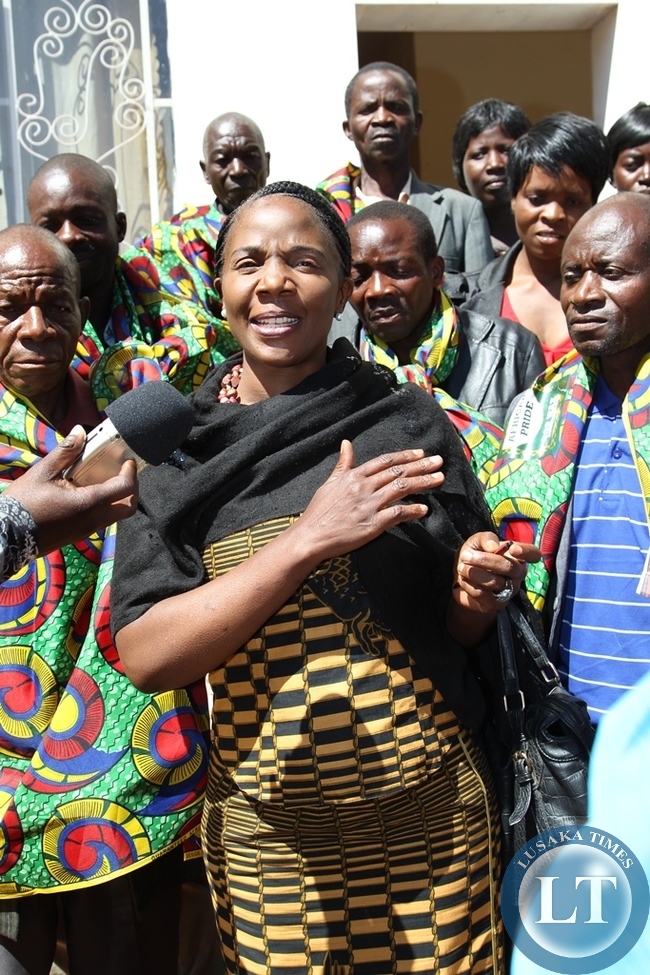 Independent candidate Prudence Mwansa talks to her supporters after successfully filing in nominations for Bangweulu constituency in Samfya