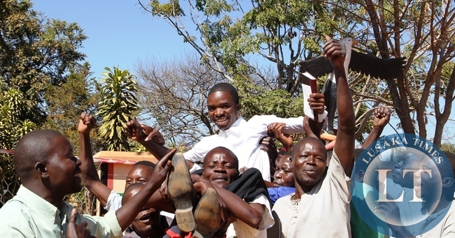 NAREP Candidate Morgan Mwewa lifted shoulder high by his supporters after successfully filing in nominations as aspiring candidate for Bangweulu constituency in Samfya