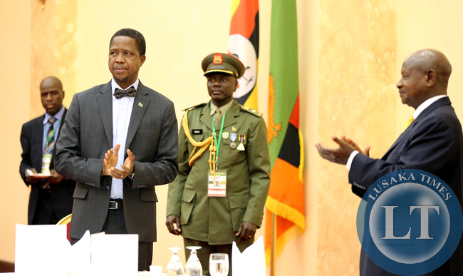 President Edgar Lungu with President Yoweri Museveni at a state dinner at Entebe Statehouse