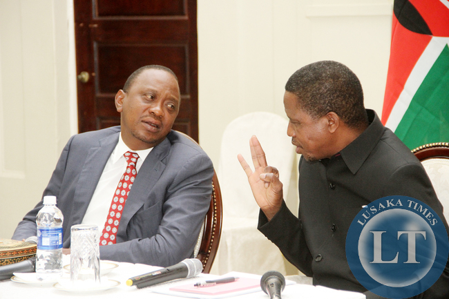President Lungu-Kenyatta 1100 President Lungu and Kenya's President Uhuru Kenyatta with Ministers after the bilateral talks at State House in Lusaka on July 3,2015 -Picture by THOMAS NSAMA