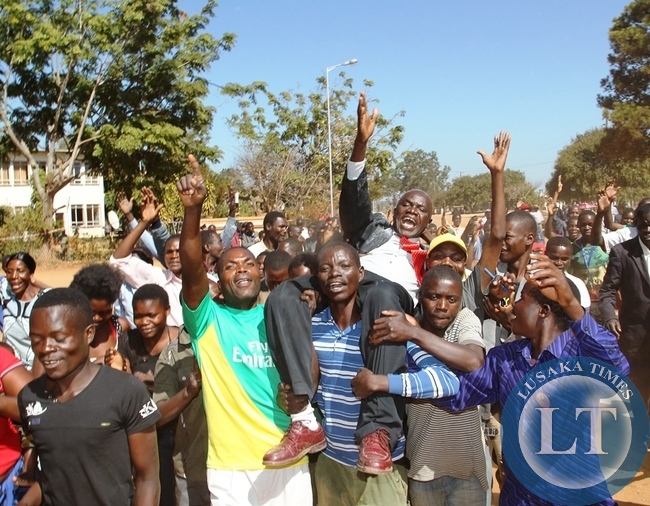 UPND Candidate Bianco Muma lifted shoulder high by his supporters after successfully filing in nominations as aspiring candidate for Bangweulu constituency in Samfya