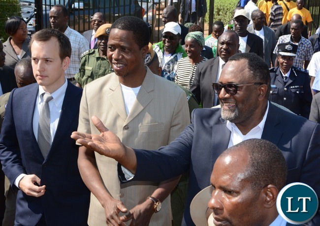 Director of Yalelo Zambian Fish Fisho Mwale welcomes President Edgar Lungu (c) Chairman of the board Adam Taylor (l) looks on during the Commissioning of the Yalelo Zambian Fish in Siavonga