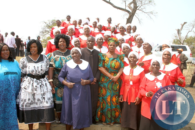 First Lady Esther Lungu , Ministry of Community Development, Mother and Child Health Deputy minister Josphine Limata, UCZ Reverend Mulenga Kaite and Church members pose for a photograph after the Church service at Senanga UCZ St Mathews Congregation on Sunday, August 23,2015 -Picture by THOMAS NSAMA