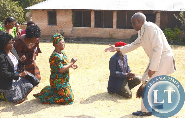 First Lady Esther Lungu greets Senior Chief Amukena II on arrival at his palace in Kaoma where she paid a Courtesy call on him in Western Province on Saturday, August 15,2015 -Picture by THOMAS NSAMA