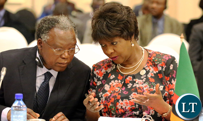 Minister of Commerce, Trade and Industry Margaret Mwanakatwe with Permanent secretary Siazongo Sikalenge at SADC 35th Council Of Ministers meeting in Botswana on Friday Picture By EDDIE MWANALEZA.