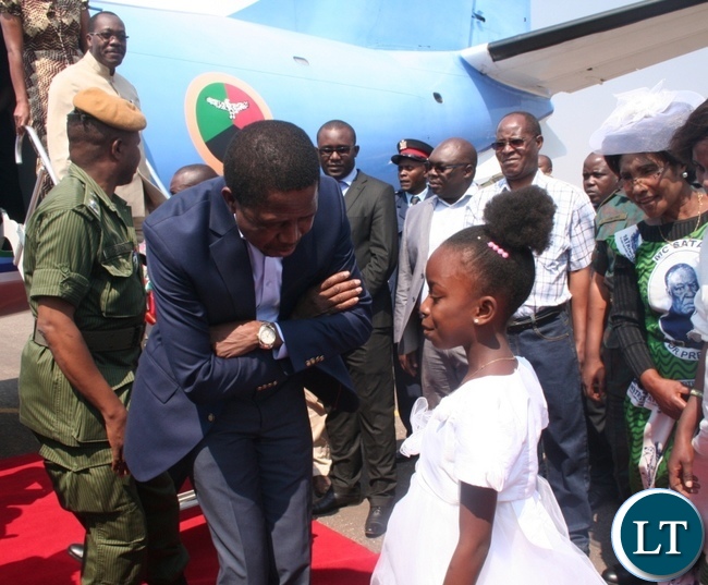 President Edgar Lungu talks to a nine year old girl Sante Mwanza upon arrival at Solwezi airport as provincial Patriotic Front (PF) women’ chairlady Martha Mpila ( r) looks on in Solwez President Edgar Lungu talks to a nine year old girl Sante Mwanza upon arrival at Solwezi airport as provincial Patriotic Front (PF) women’ chairlady Martha Mpila ( r) looks on in Solwez