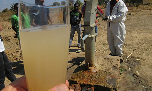 Water from a borehole drilled by KCM at Shimulala village, Zambia. Photograph: John Vidal for the Observer
