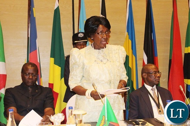 VICE President Inonge Wina gives her speech during the official opening of International Conference on the Great Lakes Region (ICGLR) meeting of Ministers of Justice on domestication of ICGLR of protocols at Zambezi Sun Hotel in Livingstone Yesterday. On the right is Justice Minister Ngosa Simbyakula and ICGLR Secretary General Antonio Bembe.