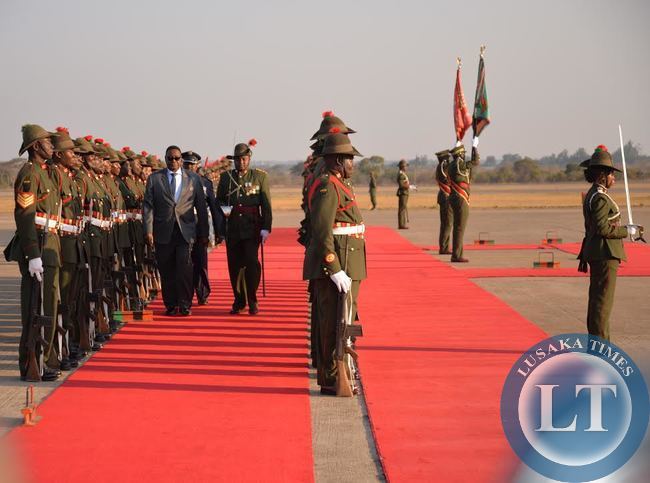 MALAWIAN President Peter Mutharika inspects a guard of honour mounted for him on arrival at the Kenneth Kaunda International Airport in Lusaka