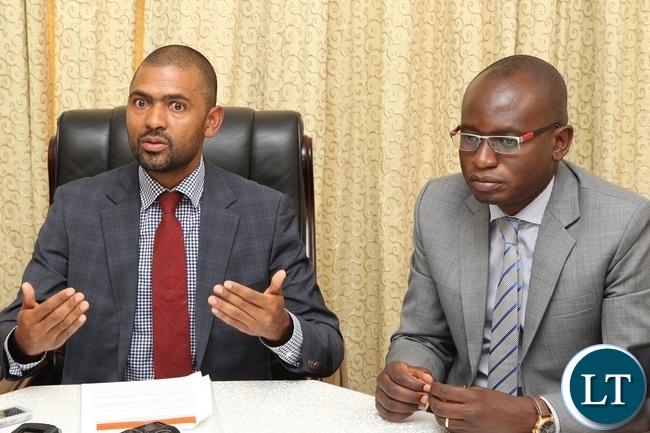 Acting Government spokesperson Vincent Mwale who is also Minister of Youth and Sports with Special Assistant for Press and Public Relations to the President Amos Chanda during the briefing at State House