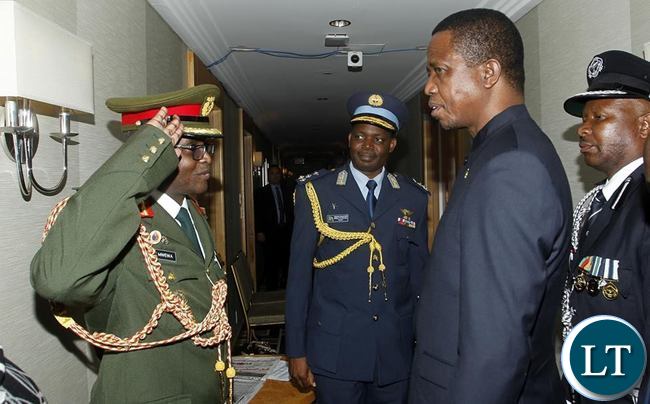 President Edgar Chagwa Lungu (second from right) being welcomed by his Defence Attaches Brigadeer General Erick Mwenya (left) Henry Mukuka (centre) at Palace Hotel in New York on Thursday,September 24,2015. PICTURE BY SALIM HENRY/STATE HOUSE ©201