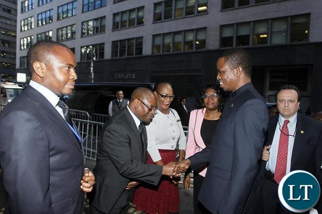 Edgar Chagwa Lungu (second from right) being welcomed by his Special Assistant for Economy and Development Affairs Hibeene Mwiinga (second from left) at Palace Hotel in New York on Thursday,September 24,2015. PICTURE BY SALIM HENRY/STATE HOUSE ©2015