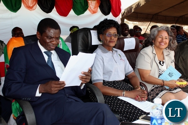Education Deputy Minister David Mabumba (l), Zambia National Education Coalition (ZANEC) Member Organisation representative Gina Chiwela (c) and USAID Zambia Education Office Chief Iris Young (r) during the celebration of International Literacy Day at Mulambwa Primary School in Mongu Education Deputy Minister David Mabumba (l), Zambia National Education Coalition (ZANEC) Member Organisation representative Gina Chiwela (c) and USAID Zambia Education Office Chief Iris Young (r) during the celebration of International Literacy Day at Mulambwa Primary School in Mongu