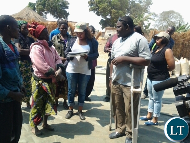 FOOD Reserve Agency executive director Chola Kafwabulula talking to a farmer at Chiwoko FRA depot in Chipata