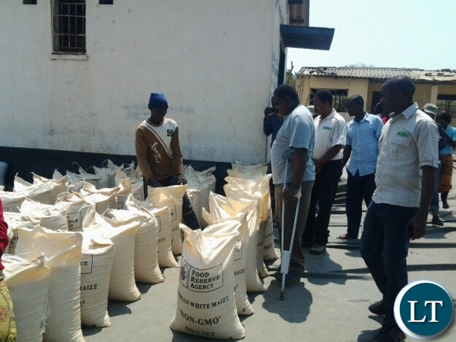 FOOD Reserve Agency executive director Chola Kafwabulula talking to farmers at FRA satelite depot at Kamulaza in Chipata