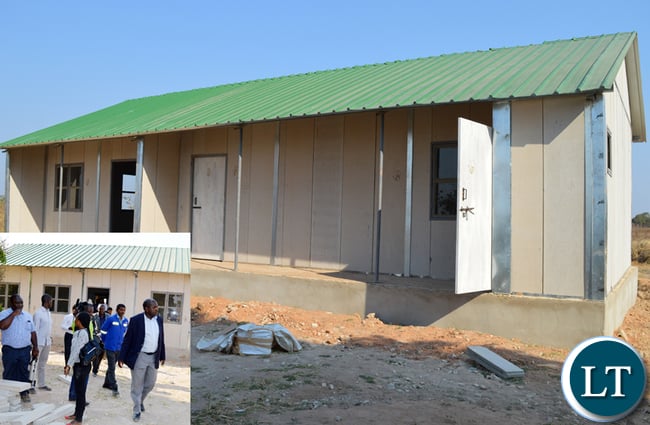 HEALTH deputy Minister Chitalu Chilufya (in a jacket) inspects Siankope rural health post in Choma yesterday which was among the 650 facilities under construction countrywide. Picture by CHILA NAMAIKO HEALTH deputy Minister Chitalu Chilufya (in a jacket) inspects Siankope rural health post in Choma yesterday which was among the 650 facilities under construction countrywide. Picture by CHILA NAMAIKO