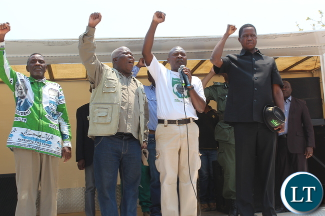 President Edgar Lungu with PF Lubanseshi candidate George Mwansa when he address a huge rally at Mucheleka school today. looking on is campaign manager Freedom Sikazwe, Mwansabombwe MP Rogers Mwewa and Senior Private Secretary to the President Danniel Sio :Picture by Mary Bwembya (ZANIS)