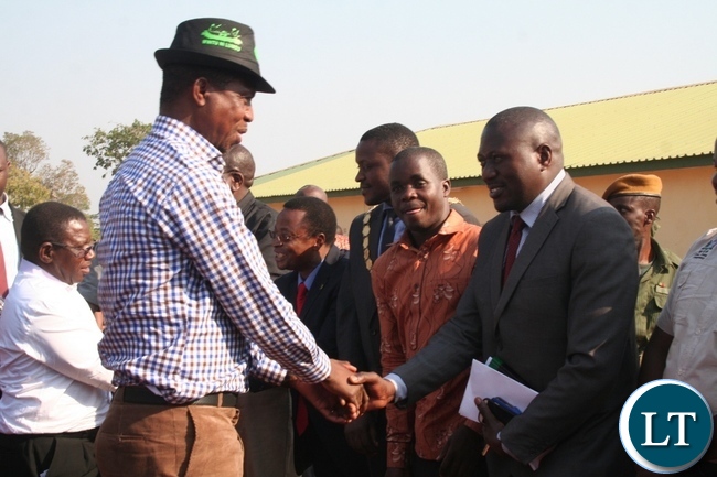 PRESIDENT Edgar Lungu is welcomed by provincial medical officer Dr Simulyanama Choonga (r ) during the commissioning of Luwama district hospital in Kalumbila district in North- Western province on Sunday. Picture by BETRAM KAOMA /ZANIS