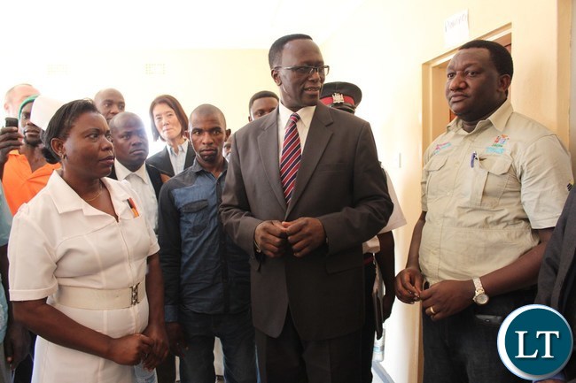 EASTERN Province Permanent Secretary, Chanda Kasolo (c) flanked by regional Medial Officer, Dr. Abel Kabalo and Dwankhozi health post Nurse –in- Charge, Beauty Jere, during the tour of the facility after it was handed over to the community following the construction by JTI EASTERN Province Permanent Secretary, Chanda Kasolo (c) flanked by regional Medial Officer, Dr. Abel Kabalo and Dwankhozi health post Nurse –in- Charge, Beauty Jere, during the tour of the facility after it was handed over to the community following the construction by JTI