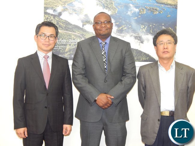 High Commissioner His Excellency Mr. Mwamba with representatives from KEPCO KPS, Mr. Jason Lee (left) and LG International, Mr. Dow Lee after the meeting at the High Commission in Pretoria