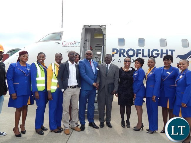 Zambia's High Commissioner to South Africa, His Excellency Mr Emmanuel Mwamba poses for a photo with staff from Proflight Zambia, Airports Corporation of South Africa and the High Commission.This was after the inaugural Proflight Zambia flight from Lusaka to Durban arrived at King Shaka International Airport in Durban, South Africa on Monday, 21st September, 2015. PICTURE BY NICKY SHABOLYO