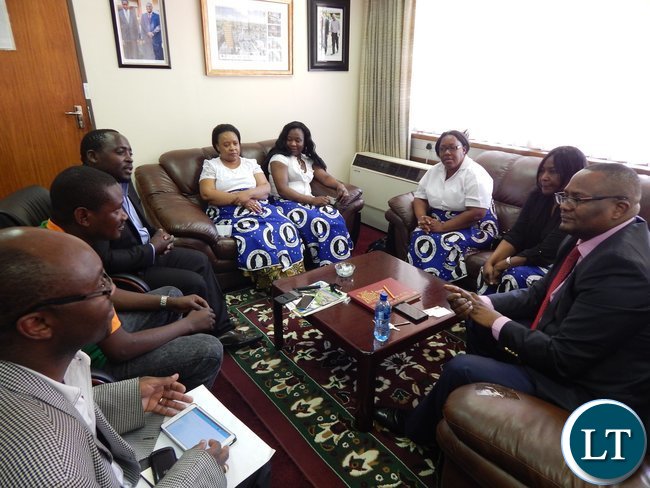 Zambia's High Commissioner - Designate to South Africa, His Excellency, Mr. Emmanuel Mwamba with members of the Zambian Catholic Community in South Africa in his office