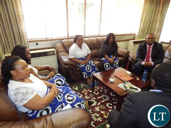 Zambia's High Commissioner - Designate to South Africa, His Excellency, Mr. Emmanuel Mwamba with members of the Zambian Catholic Community in South Africa in his office