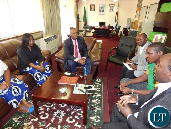 Zambia's High Commissioner - Designate to South Africa, His Excellency, Mr. Emmanuel Mwamba with members of the Zambian Catholic Community in South Africa in his office