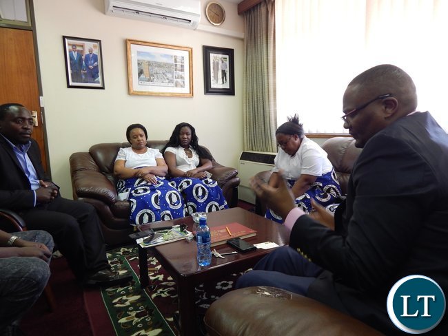 Zambia's High Commissioner - Designate to South Africa, His Excellency, Mr. Emmanuel Mwamba with members of the Zambian Catholic Community in South Africa in his office