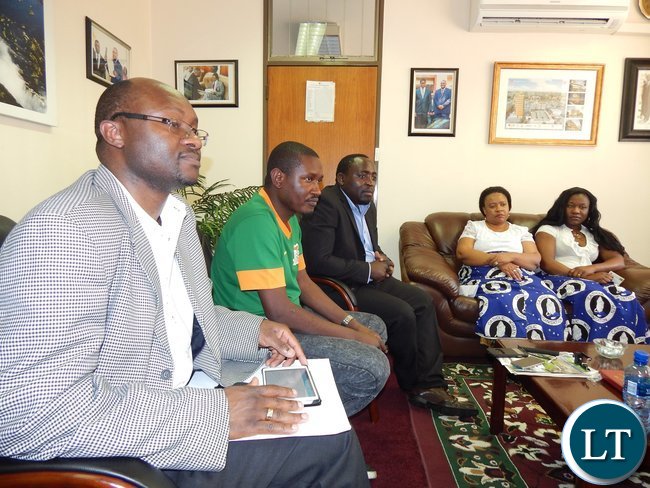 Zambia's High Commissioner - Designate to South Africa, His Excellency, Mr. Emmanuel Mwamba with members of the Zambian Catholic Community in South Africa in his office