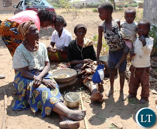 Theresa Chilambwe 90 and Veronica Chilambwe 96, with their great grand children Gladys Chola 6, Isaac Chanda 4 and Easter Chilambwe left by her granddaughter at her residence in Mulenga Hills Village in Kasama . The Family is appealing to well-wishers to help her renovate her house which is on the verge of collapsing.