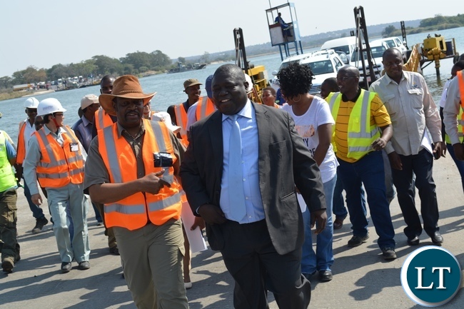 Zambia's Transport, Works, Supply and Communication Minister Yamfwa Mukanga (right) and Botswana Minister for Transport and Communications Tshenolo Mabeo (left) during an inspection of Kazungula Bridge project