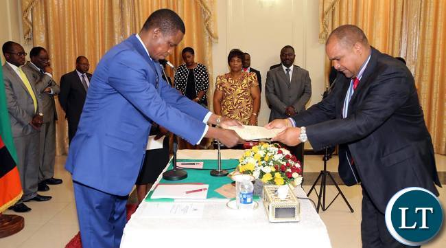 President Edgar Lungu swears in Petauke member of Parliament Dora Siliya as Energy and Water Development Minister. The President has also sworn in Livingstone Central member of Parliament Lawrence Evans as Deputy minister of Livestock and Fisheries at State House on Friday 16-10-2015- Pictures By Eddie Mwanaleza/Statehouse.