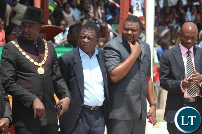 Mongu Mayor Bright Tombi (l), Mongu District Commissioner Susiku Kamona (c) and Western Province Deputy Permanent Secretary Bernard Chomba (r) waiting for the arrival guest of honour Labour Minister Fackson Shamenda to officiate the 51st Independence Anniversary celebrations at Mongu Sports Stadium Mongu Mayor Bright Tombi (l), Mongu District Commissioner Susiku Kamona (c) and Western Province Deputy Permanent Secretary Bernard Chomba (r) waiting for the arrival guest of honour Labour Minister Fackson Shamenda to officiate the 51st Independence Anniversary celebrations at Mongu Sports Stadium