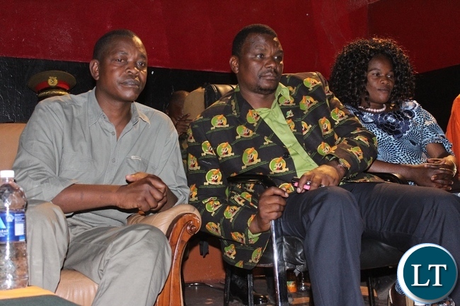 1 Western Province Minister Poniso Njeulu (l) with his Deputy Permanent Secretary Bernard Chomba (c) at the Countdown eve for the 51st Independence Anniversary at Mongu Sports Stadium on Friday night.