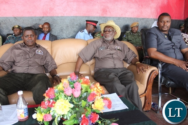 Labour Minister Fackson Shamenda (c) flanked by Western Province Permanent Secretary Mwangala Liomba (l) and Western Province Deputy Permanent Secretary Bernard Chomba (r) during the 51st Independence Anniversary celebrations at Mongu Sports Stadium Labour Minister Fackson Shamenda (c) flanked by Western Province Permanent Secretary Mwangala Liomba (l) and Western Province Deputy Permanent Secretary Bernard Chomba (r) during the 51st Independence Anniversary celebrations at Mongu Sports Stadium