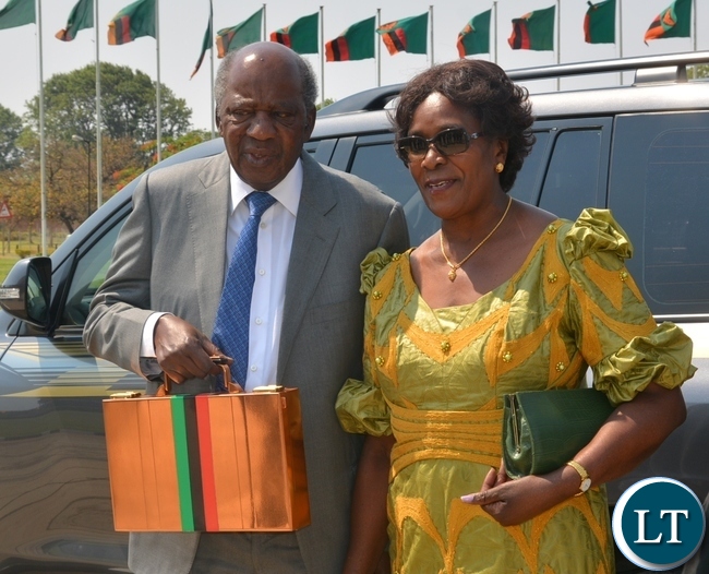 Finance Minister Alexander Chikwanda with wife Margaret on arrival at Parliament Building yesterday before presentation of the 2016 National Budget.