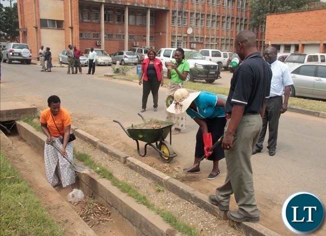 Ministry of information and Broadcasting Service staffs cleaning during the relaunch of KEEP ZAMBIA CLEAN at Mass media