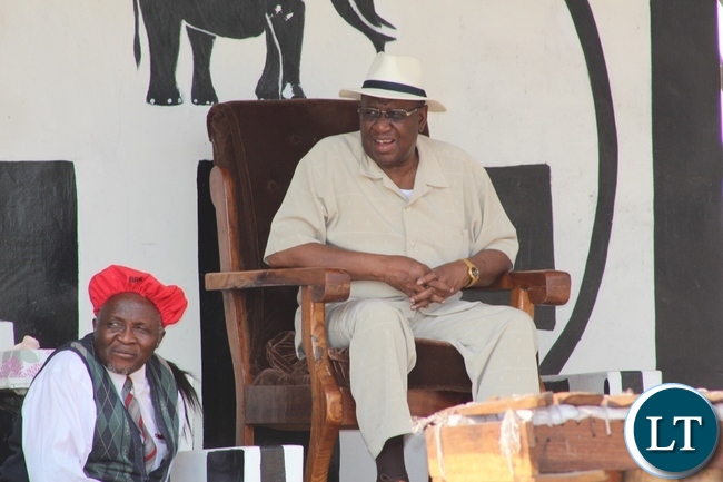 His Majesty the Litunga Lubosii Imwiko II (r) shares a light moment with Western Province Permanent Secretary Mwangala Liomba (c) during the 15th Anniversary of the Coronation of His Majesty the Litunga in Limulunga Royal Village of Limulunga District His Majesty the Litunga Lubosii Imwiko II (r) shares a light moment with Western Province Permanent Secretary Mwangala Liomba (c) during the 15th Anniversary of the Coronation of His Majesty the Litunga in Limulunga Royal Village of Limulunga District