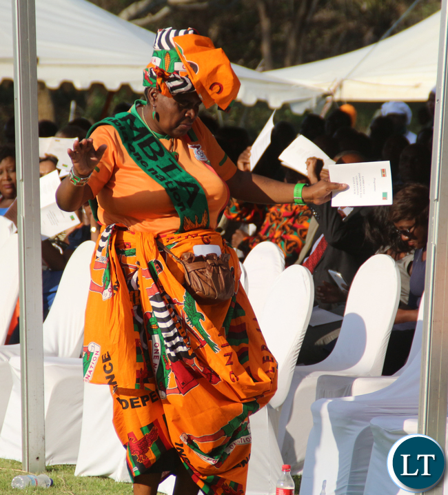 A Zambian lady dancing.