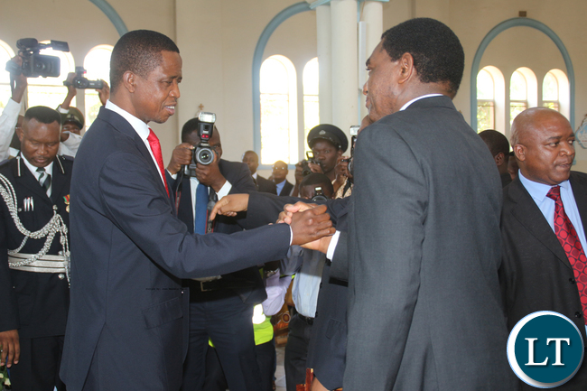President Lungu greets UPND president Hakainde Hichilema during the memorial service of the Late President Michael Chilufya Sata at St Ignatius Catholic Church in Lusaka