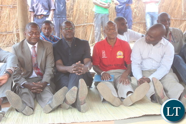 (L to R ) Central Province Minister Davis Chisopa,Justice Minister Ngosa Simbyakula,Chibombo District Commissioner Felix Mangwato and Central Province Deputy Permanent Secretary Ronald Sinyangwe seat on a reed matt during the Kulamba Kubwalo Traditional Ceremony.