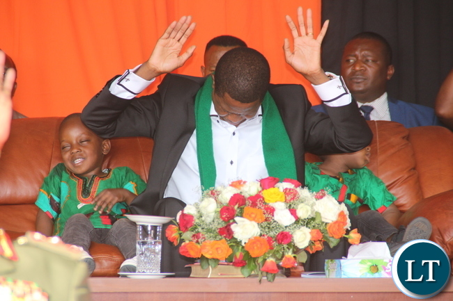 Edgar Lungu during the Fasting and Prayer Church services at Lusaka Showground: praying , mediating and releasing dove