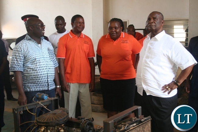 Higher education minister Dr Michael Kaingu (r) with North-Western province permanent secretary Amos Malupenga (l) and Solwezi Trades principal Edmond Kambobe (second left) and Head- Mechanical engineering department Ethel Shangobeka during the tour of the learning institution in Solwezi Higher education minister Dr Michael Kaingu (r) with North-Western province permanent secretary Amos Malupenga (l) and Solwezi Trades principal Edmond Kambobe (second left) and Head- Mechanical engineering department Ethel Shangobeka during the tour of the learning institution in Solwezi
