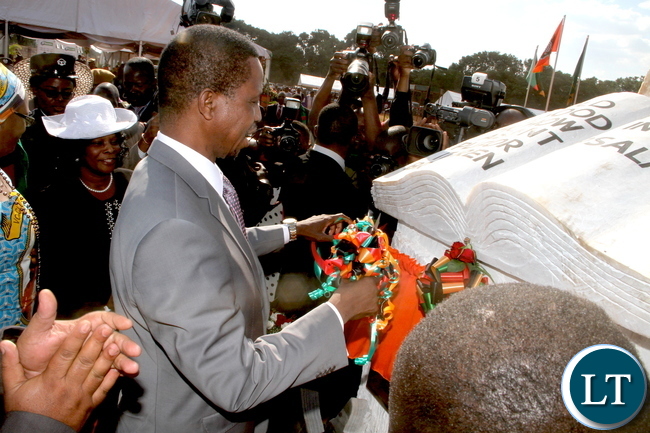 President Lungu cuts a ribbon during the Ground breaking ceremony for the New Cathedral and Interdenominational Thanks Giving Church Service at woodlands reserve forest area in Lusaka on Sunday, October 25,2015 -Pictures by THOMAS NSAMA President Lungu cuts a ribbon during the Ground breaking ceremony for the New Cathedral and Interdenominational Thanks Giving Church Service at woodlands reserve forest area in Lusaka on Sunday, October 25,2015 -Pictures by THOMAS NSAMA