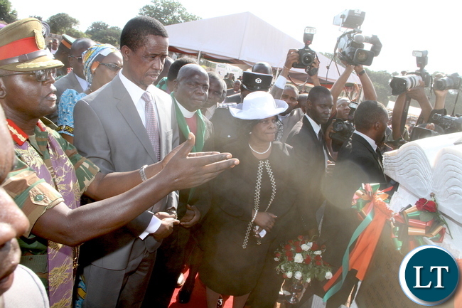 President Lungu and First Lady Esther Lungu listens to Brig Gen Bishop Vincent Mwenya during the Ground breaking ceremony for the New Cathedral and Interdenominational Thanks Giving Church Service at woodlands reserve forest area in Lusaka on Sunday, October 25,2015 -Pictures by THOMAS NSAMA