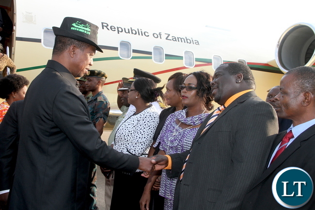 President Lungu being welcomed by Information minister Chishimba Kambwili on arrival in Ndola where he made a stop over en-route to Kitwe on Thursday, October 29,2015 -Pictures by THOMAS NSAMA